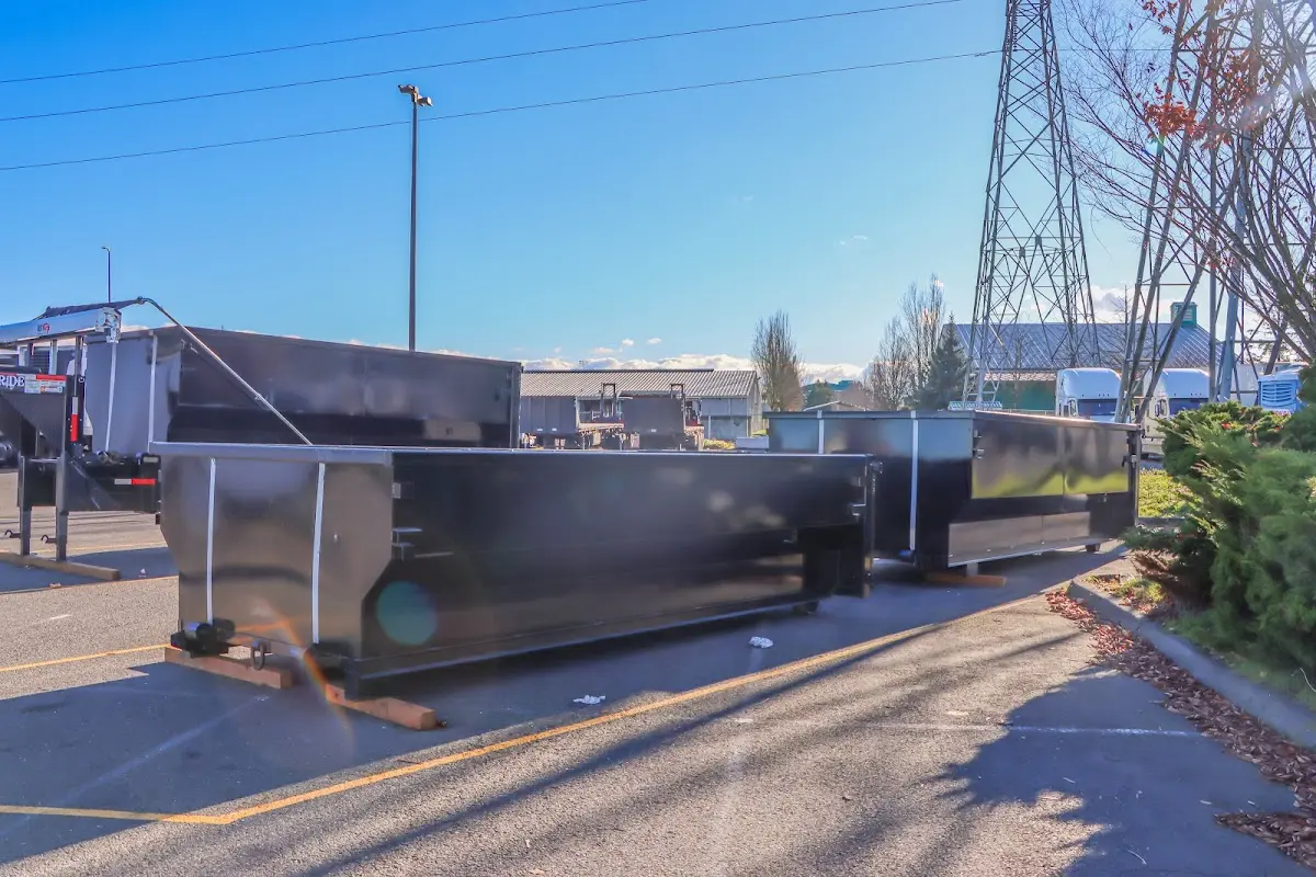 Roll-off dumpster ready for waste disposal at job site for Roofing Dumpster Rental in Calera
